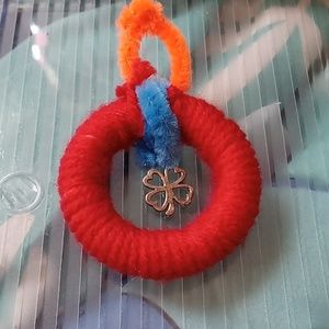 Red yarn Wrapped ornament with 4 leaf clover